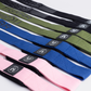 Assortiment Tigrar lifting straps in roze, blauw, groen, en zwart, klaar voor elke trainingsstijl.