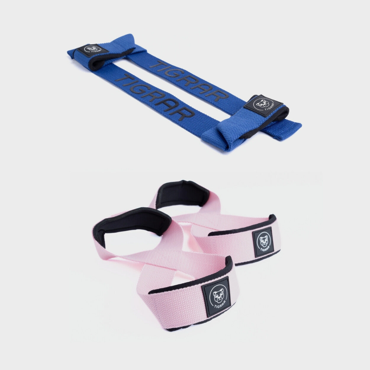 Blauwe lifting straps met roze figure 8 straps, ideaal voor een kleurrijke en stabiele krachttraining.