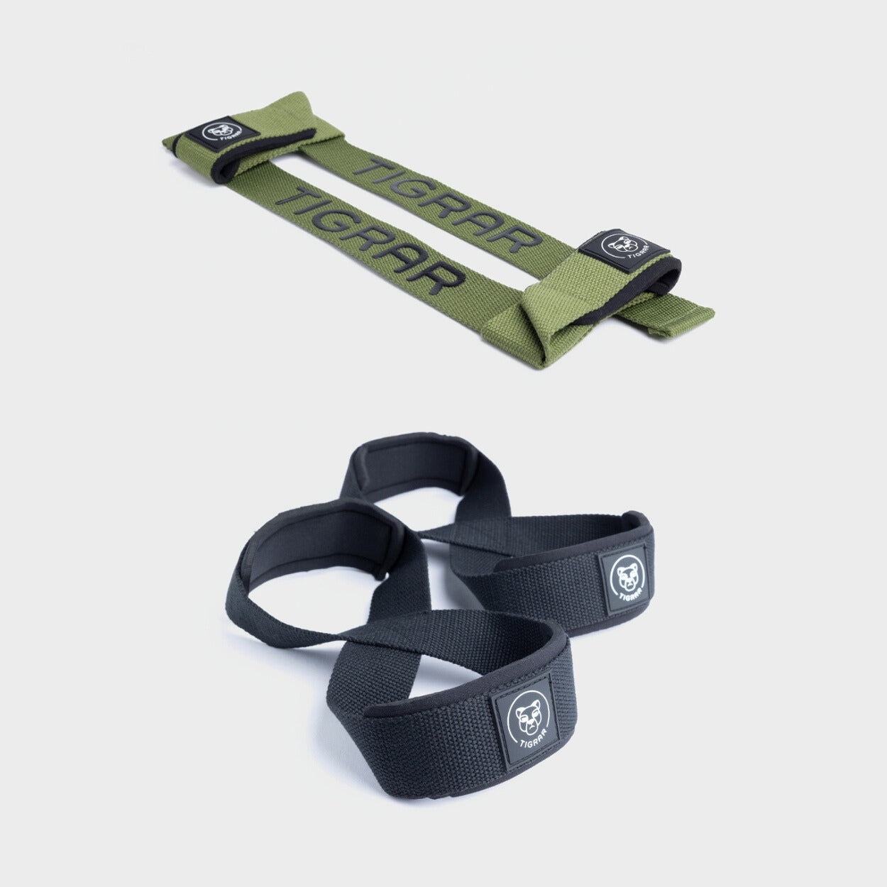 Zwarte figure 8 straps met groene lifting straps, voor een stevige en opvallende grip tijdens zware liften.