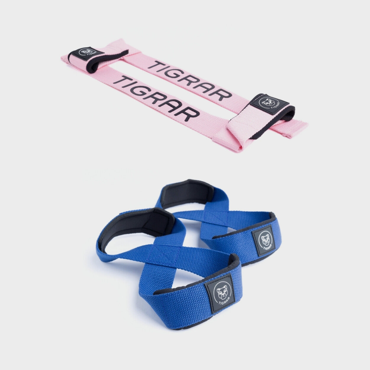 Roze lifting straps met blauwe figure 8 straps, perfect voor een stabiele en kleurrijke krachttraining.