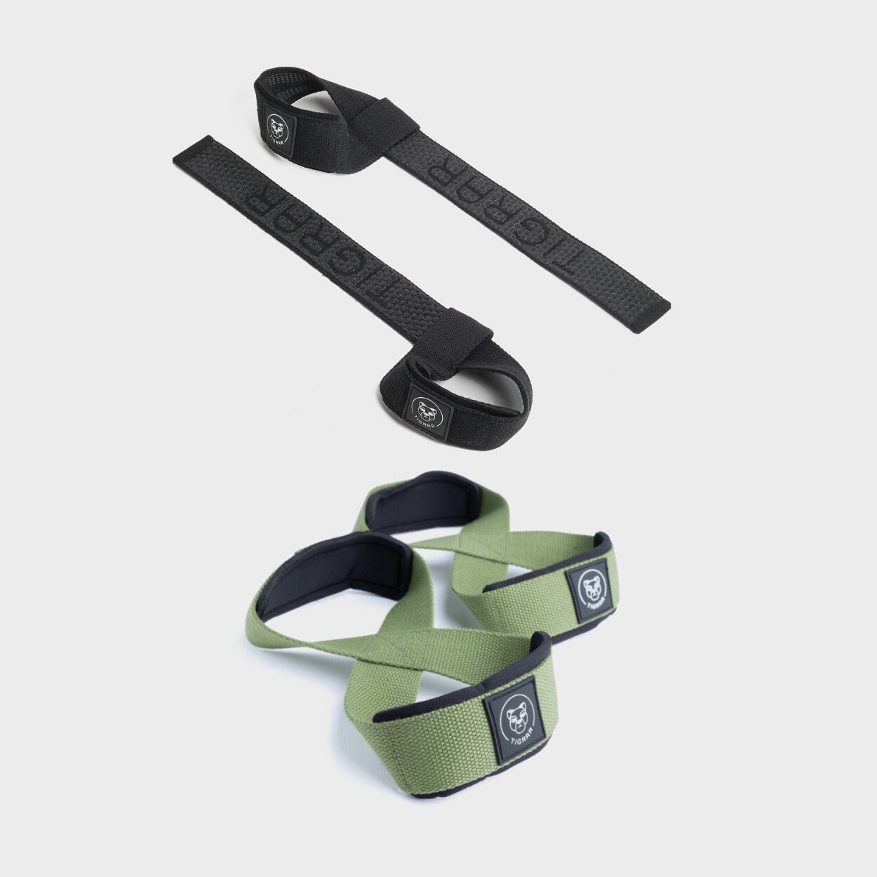 Zwarte lifting straps met groene figure 8 straps, voor een stevige en opvallende grip tijdens zware liften.